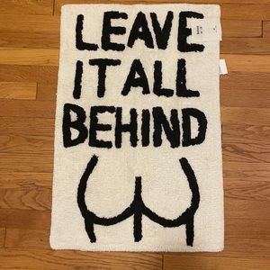 Urban Outfitters bath mat “Leave It All Behind”